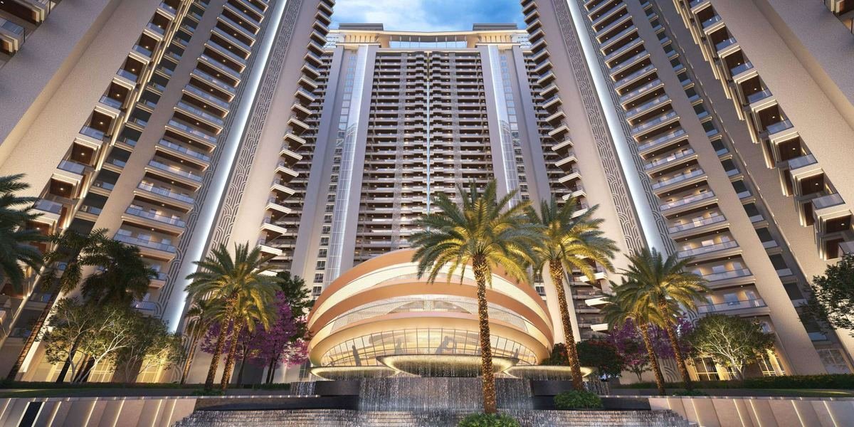 Artist’s impression of the arrival court at VVIP Addresses with a cascading water feature, palms and the residential towers rising behind.